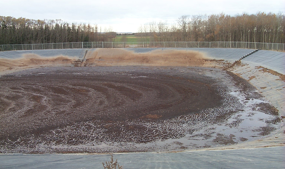 An in-ground, earthen manure storage facility, built with a synthetic liner to provide the required protection for surface and ground water