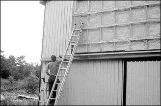 Outside-In technique of insulating a wall using Polyurethane Foam Insulation (Source: Agviro, Inc.)