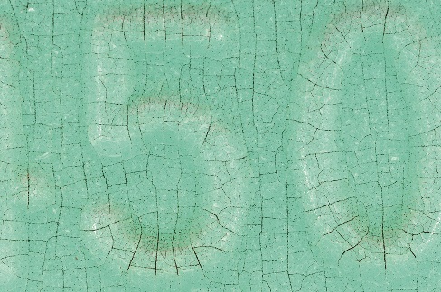 Close-up photo of polyethylene tank material showing lots of crazing or very fine, parallel cracks.