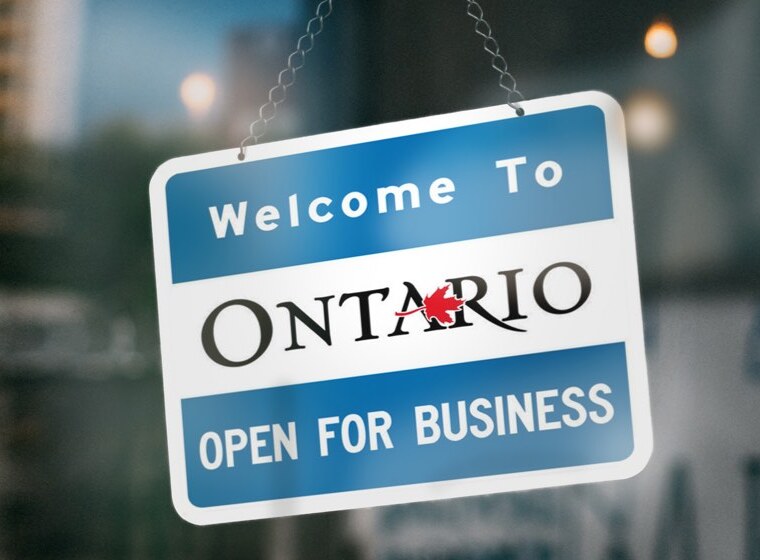 Shop sign with text "Welcome to Ontario - Open for business"