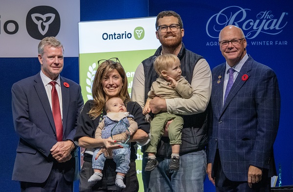 Minister Rob Flack and PA John Jordan awarding Second Harvest with the Supply Chain Excellence category award.