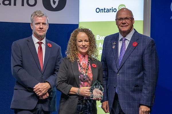 Minister Rob Flack and PA John Jordan awarding Jenny Carnaghan, Carncroft Farms with the Women’s Excellence category Award.